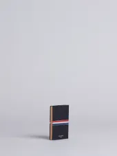 small tricolour notebook