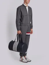 Unstructured Gym Bag With Contrast 4-bar Stripe In Pebble Grain & Calf Leather