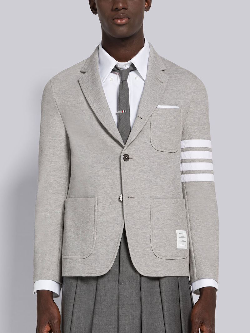 VARSITY PIQUE 4-BAR FOOTBALL SACK JACKET