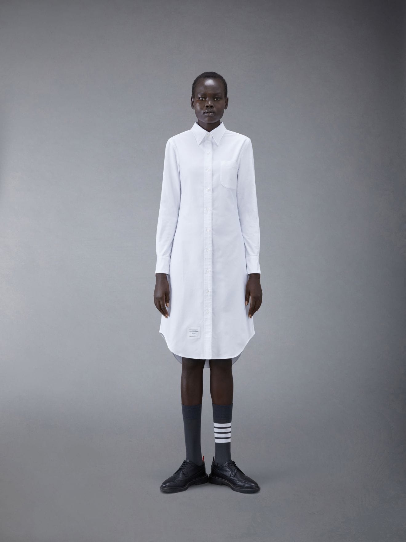 https://cdn-images.farfetch-contents.com/thom-browne-white-classic-oxford-long-sleeve-button-down-knee-length-shirtdress_12526739_45894577_1320.jpg