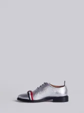 Wholecut Shoe With Red, White And Blue Leather Bow In Silver Pebble Grain