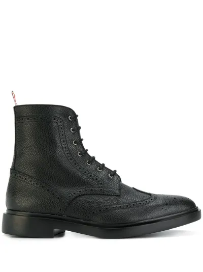 black wingtip boots