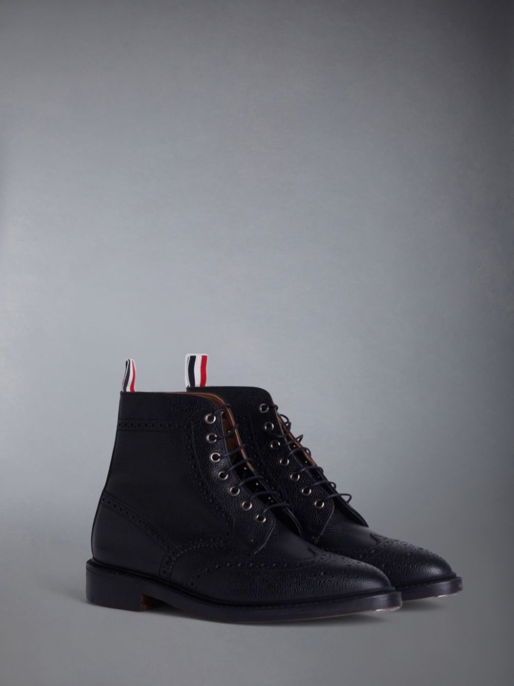 wingtip brogue boots | Thom Browne