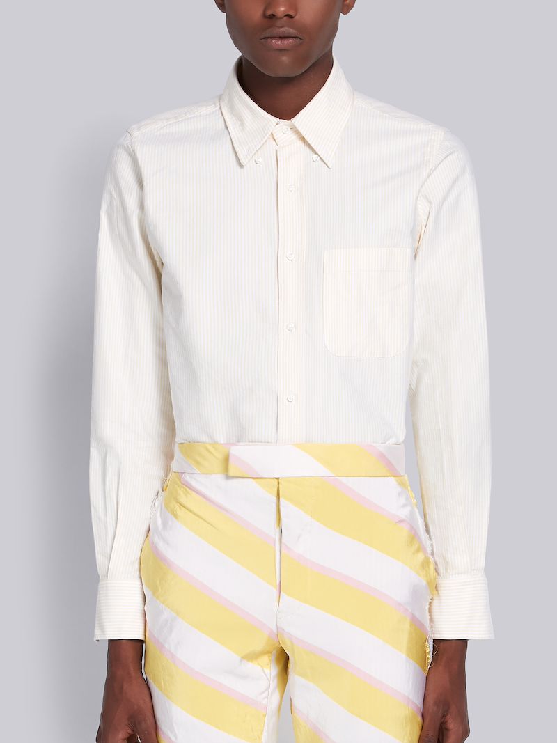 university gold color shirt