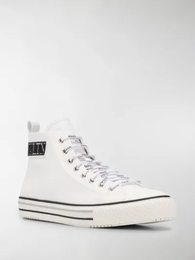 vltn white sneakers