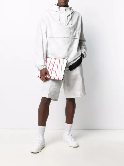 VLTN logo-print clutch bag | Valentino Garavani | Eraldo.com