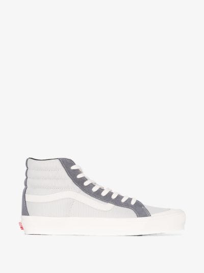 grey and white high top vans
