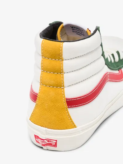 yellow and white high top vans