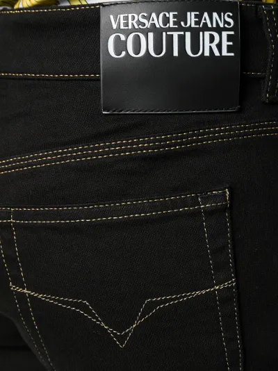 Jeans con cuciture a contrasto | Versace Jeans Couture | Eraldo.com