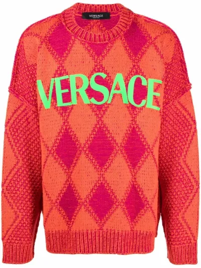 Versace Maglione con applicazione arancione | MODES