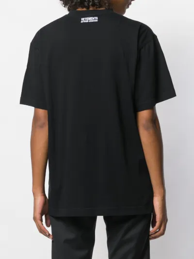 Warning print T-shirt | VETEMENTS | Eraldo.com US